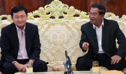 Thaksin_Shinawatra-Hun_Sen_-_10.11.09_(Chor_Sokunthea).jpg