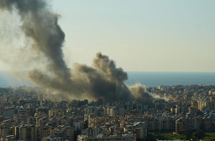 The government and Hezbollah clash after Lebanon is dragged into war