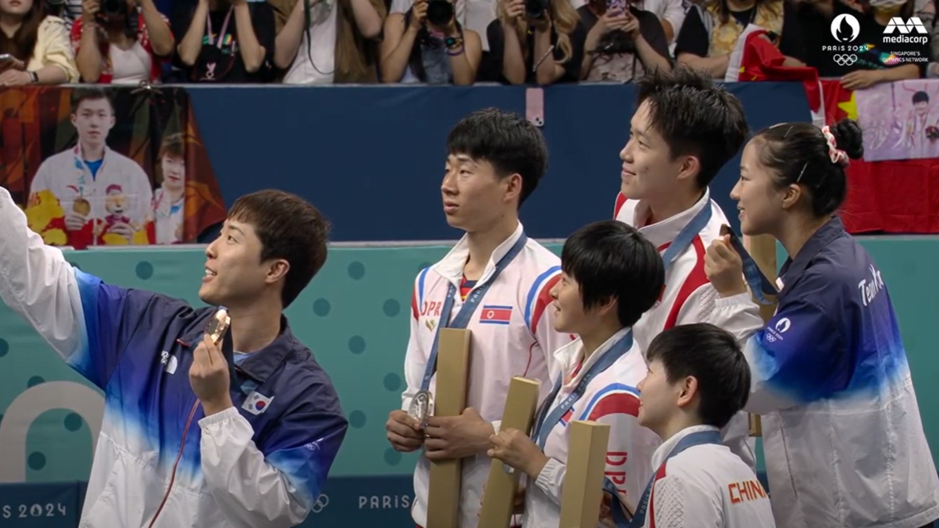 KOREA – OLYMPICS Table tennis champions from the two Koreas take a